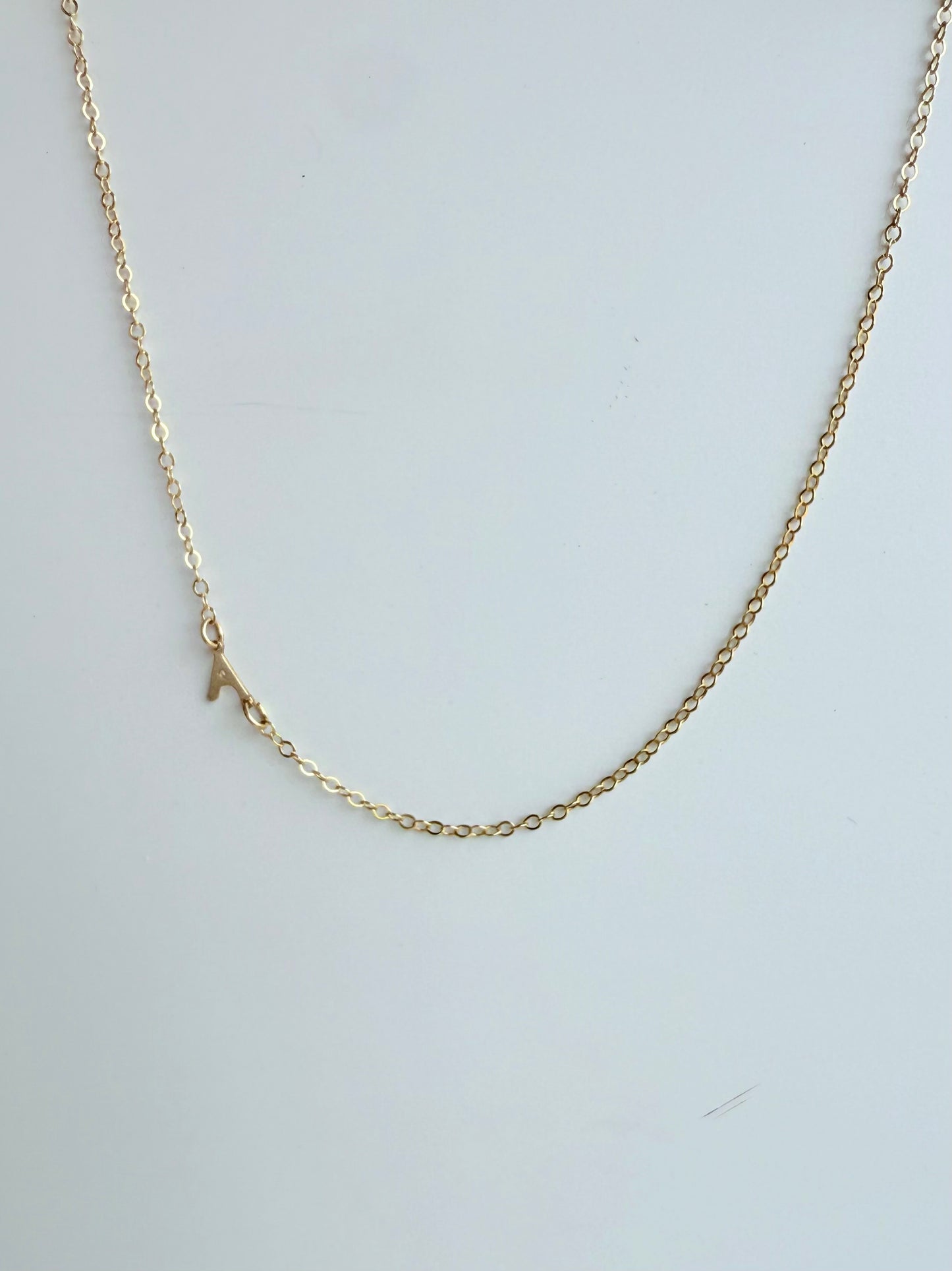 Sideways Letter Stationary Necklace