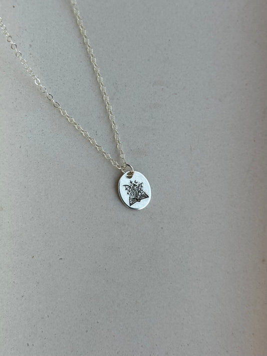 Dragon Book Medium Oval Necklace